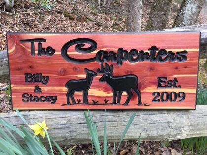 Carpenters with Deer Wood Sign